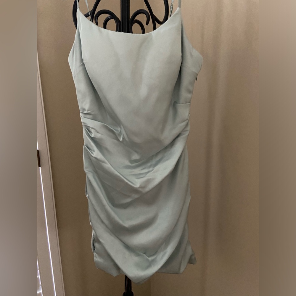 Cocktail dress in sage green.
